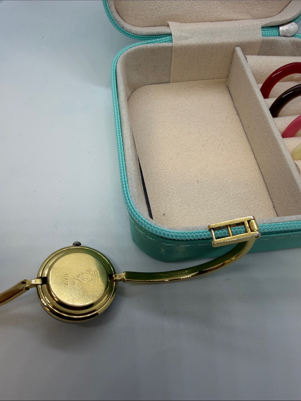Gucci Gold Bangle Watch with Light Blue Bezel and Interchangeable Bezels - Picture 5 of 6